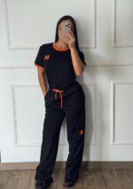 CONJUNTO HERMES NEGRO BORDE NARANJA