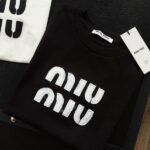 CAMISA MIU MIU BLANCA Y NEGRA