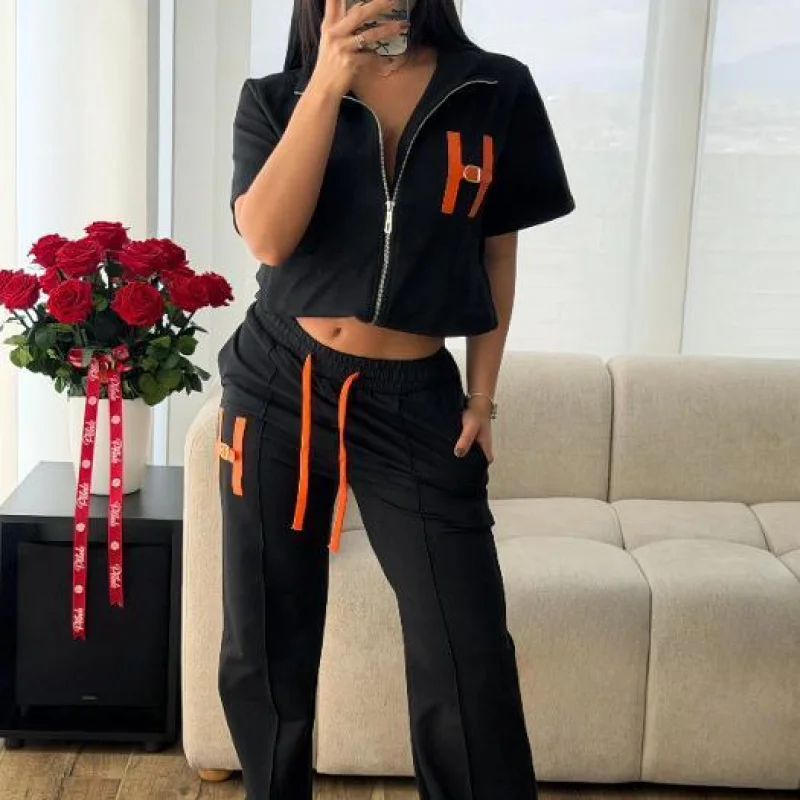 rzd_2c4c3066-b876-47db-9448-a86603dbc6f8.jpg CONJUNTO HERMES NEGRO CON LA H NARANJA - Image 1
